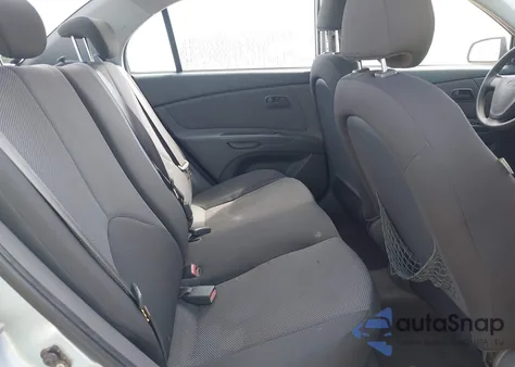 2009 Kia Rio Lx z USA, uszkodzony, nr VIN KNADE223796476940